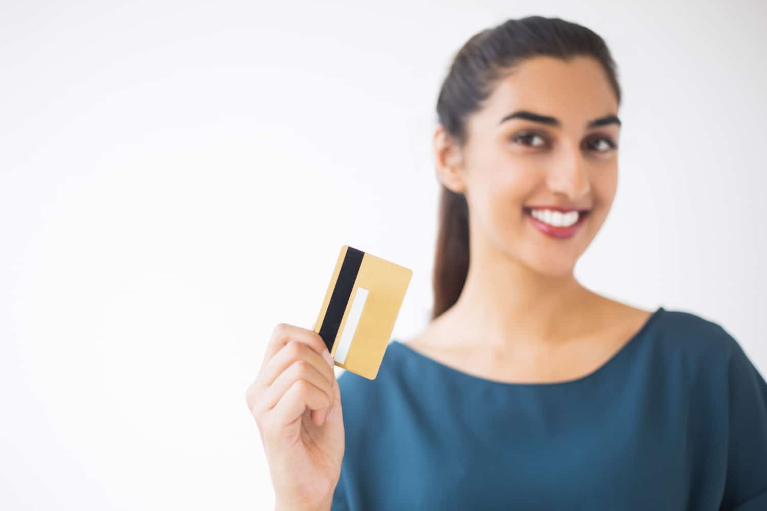 A woman using the American Express Business Gold Rewards.