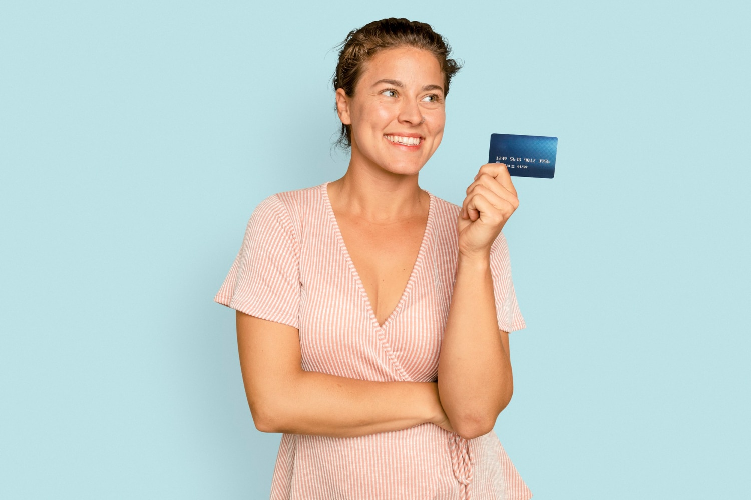 A Woman happy with her Discover it CashBack.