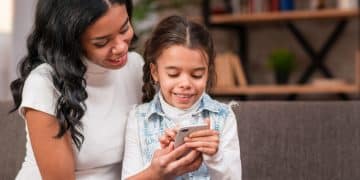 mother with her daughter using parental control app