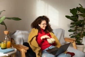 Woman watching Music Documentaries.