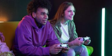 Couple playing game subscruption service