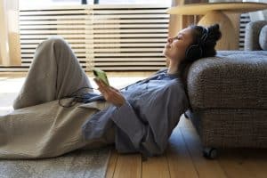 Woman listening audiobooks apps