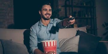 a man watching TV Shows in 2025.