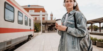 Woman having Train Travel Experiences in USA.