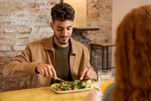 A man enjoying Best Restaurants and Cafes in New York.