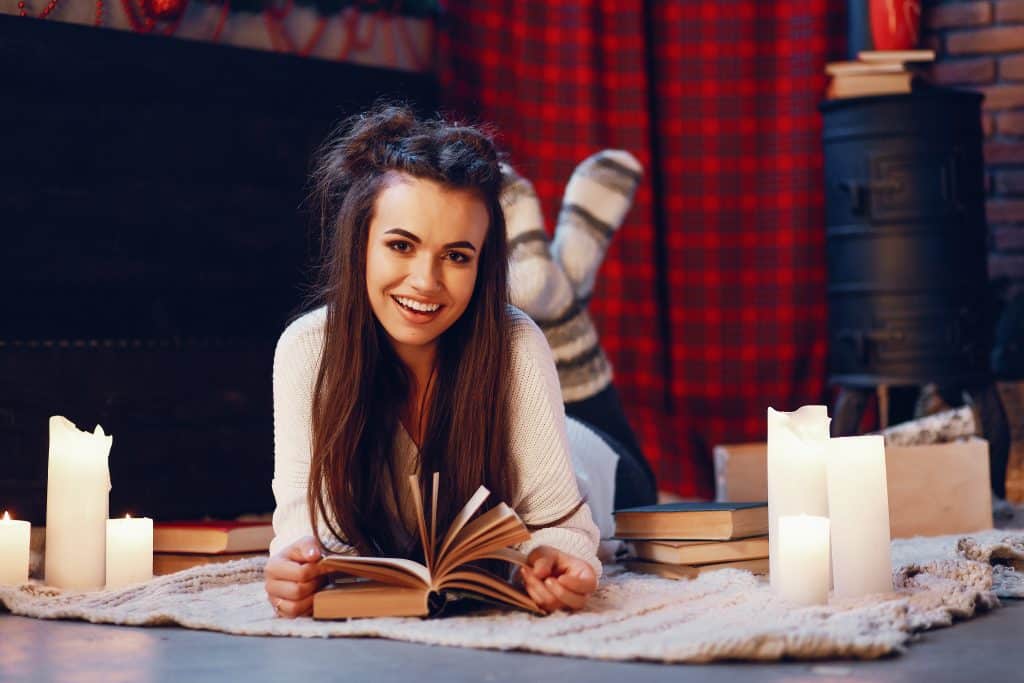 Reader exploring fantasy books released in 2026
